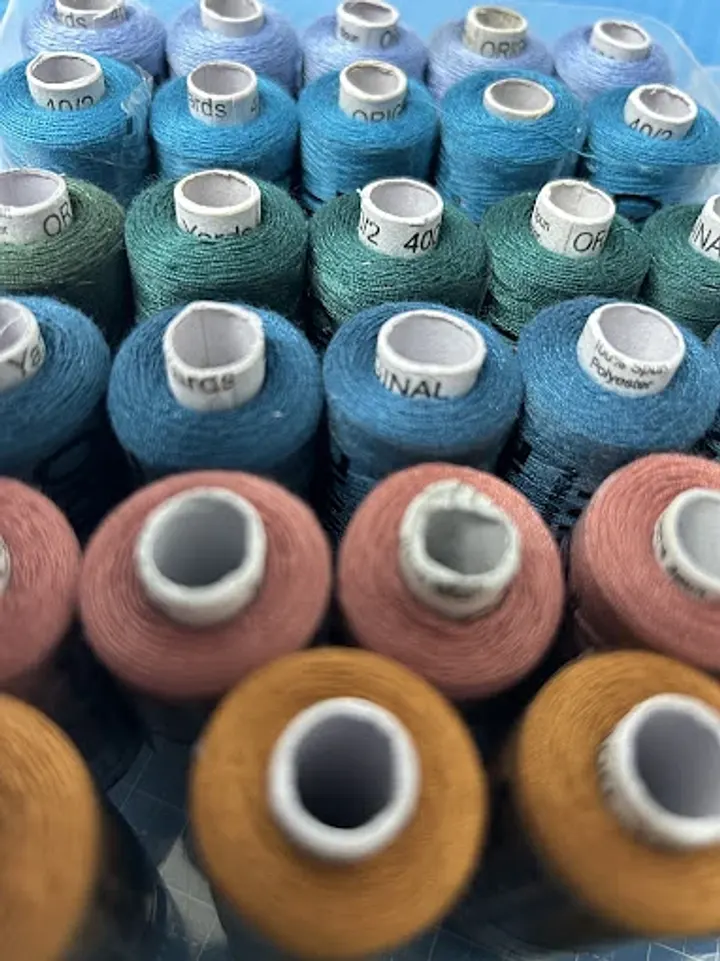 The matching thread, not a standard colour